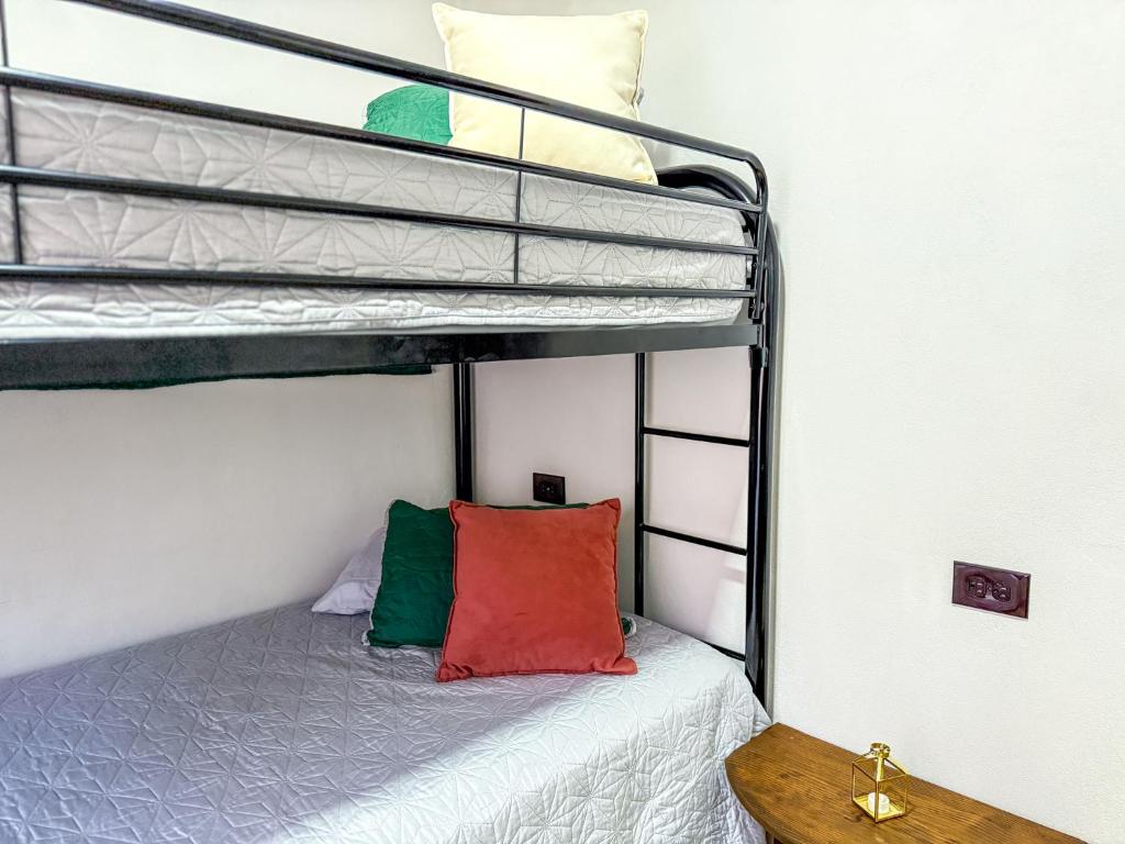 Postel nebo postele na pokoji v ubytování Brisa Amatista - Casa completa y centrica en San Ramón #1