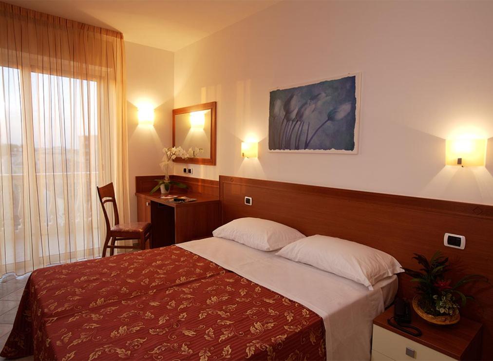 Postel nebo postele na pokoji v ubytování Hotel Boracay