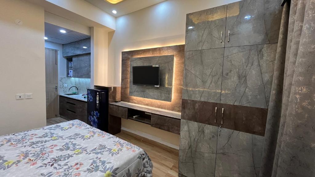 Voodi või voodid majutusasutuse Comfy Studio Apartment 5 mins from Expo Mart toas