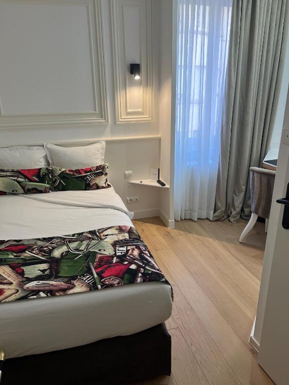 Postel nebo postele na pokoji v ubytování Maison LUTETIA R