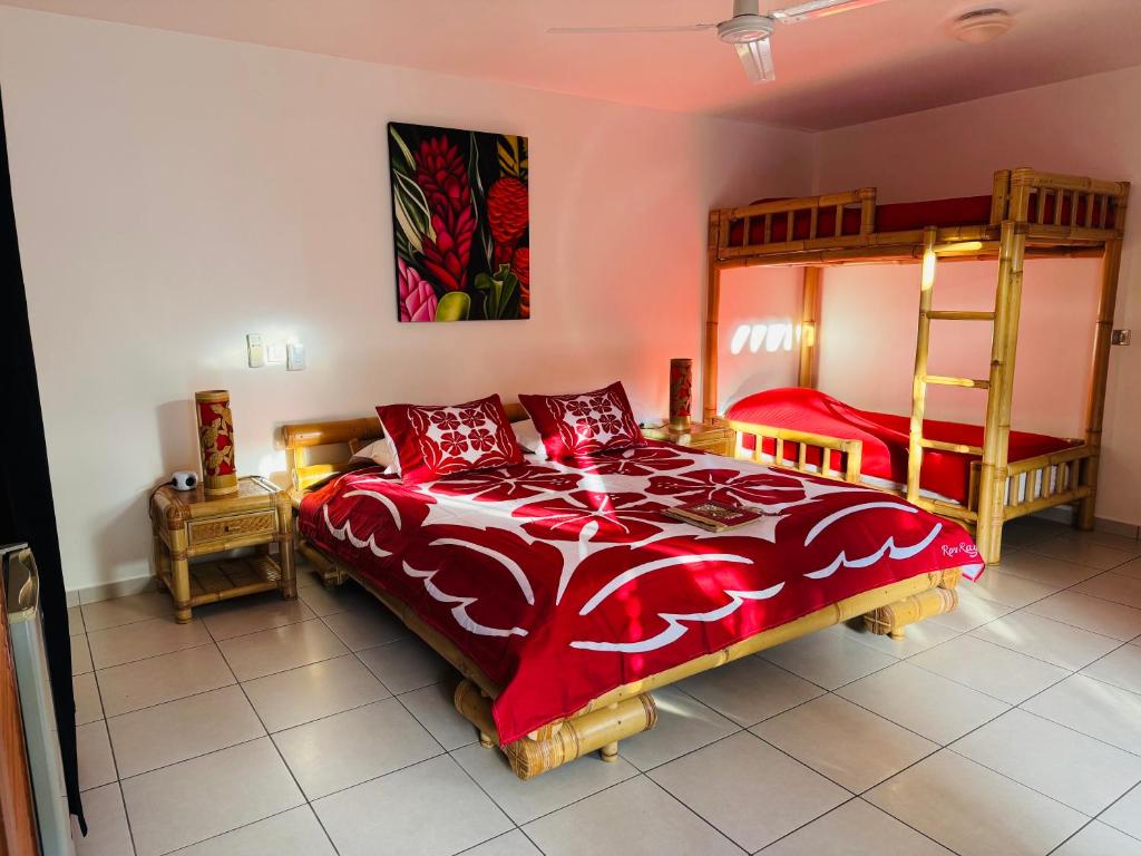 Postel nebo postele na pokoji v ubytování Relais Fenua