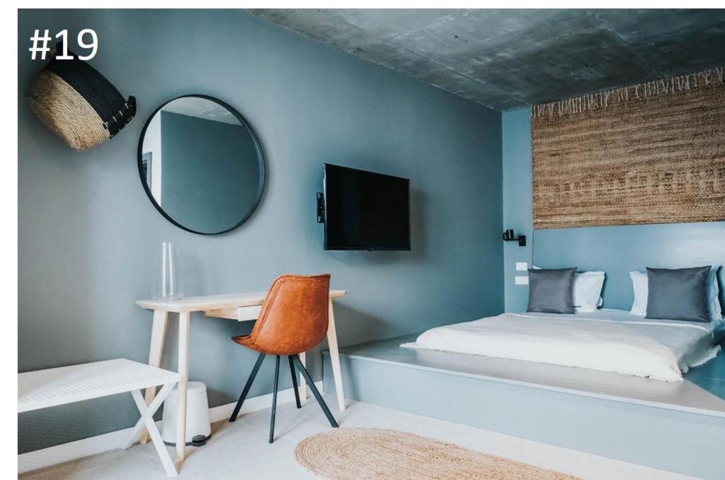 Кровать или кровати в номере The Pines Boutique Villa - Vama Veche