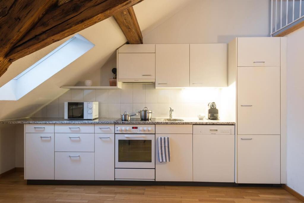 Kuchyň nebo kuchyňský kout v ubytování HITrental Zeughausgasse - Apartment