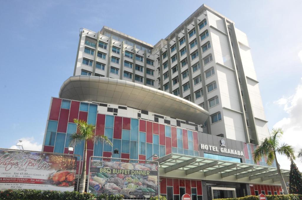 a large hotel building with a lot of windows at Hotel Granada Johor Bahru in Johor Bahru