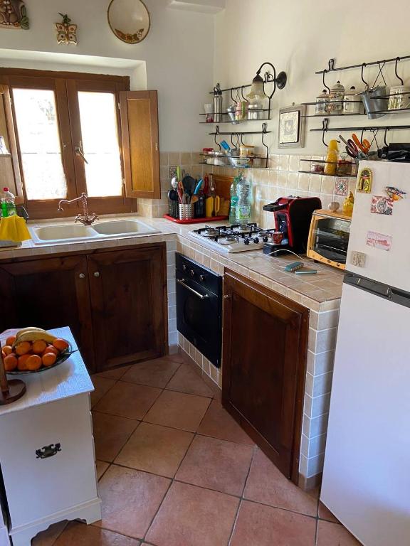Kuchyň nebo kuchyňský kout v ubytování Casa Celeste