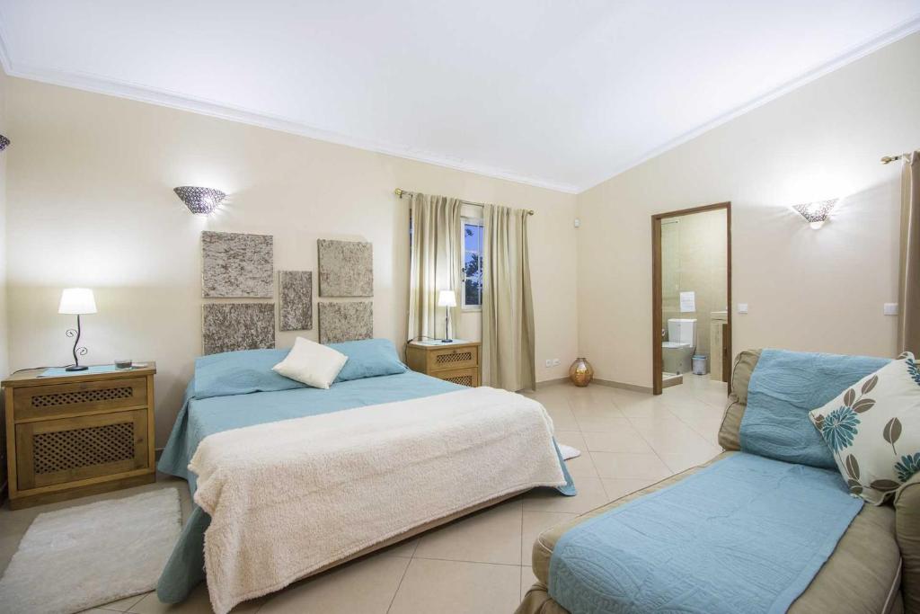 Postel nebo postele na pokoji v ubytování Villa Panoramica