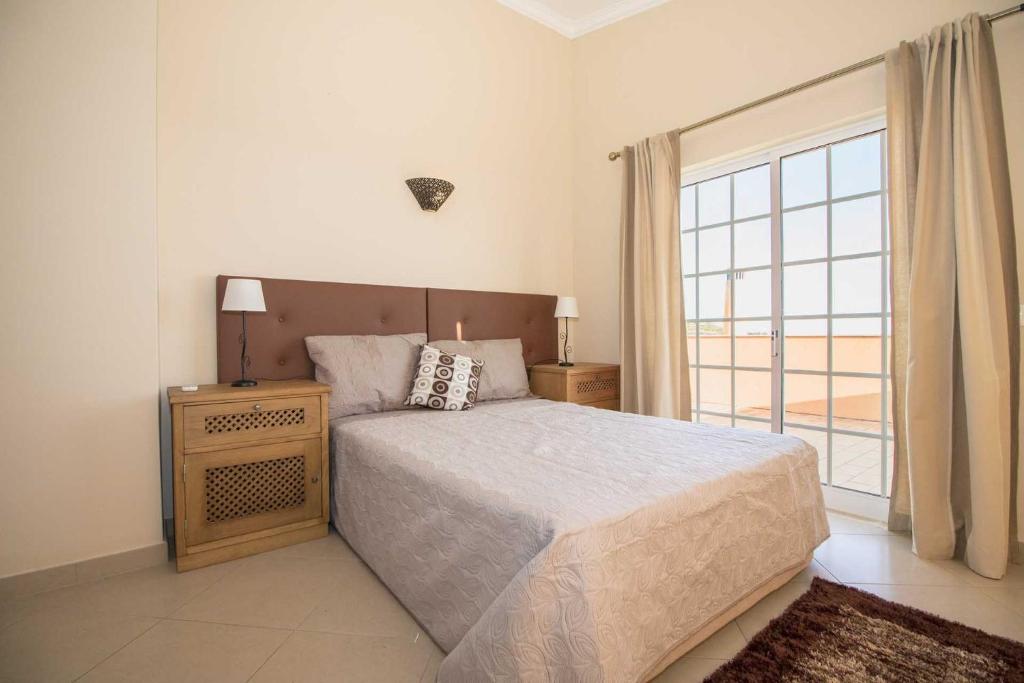 Postel nebo postele na pokoji v ubytování Villa Panoramica