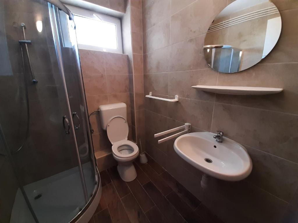 Kúpeľňa v ubytovaní 3 fös apartman