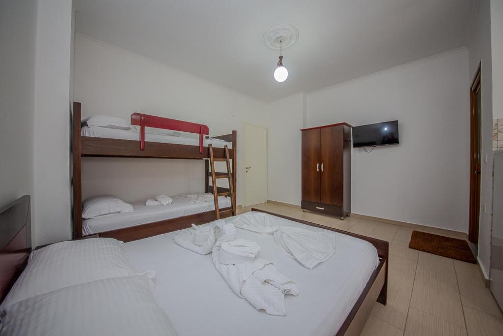 Postel nebo postele na pokoji v ubytování Hotel Landi