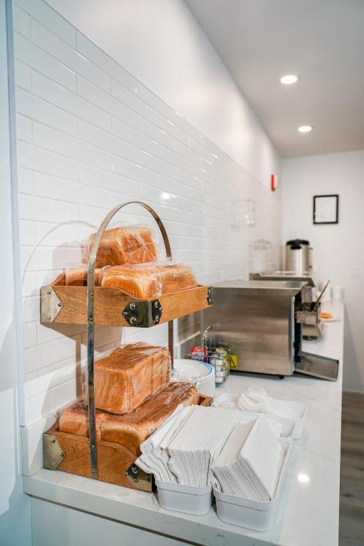 a shelf with bread on it in a kitchen at West Edmonton Mall Inn in Edmonton