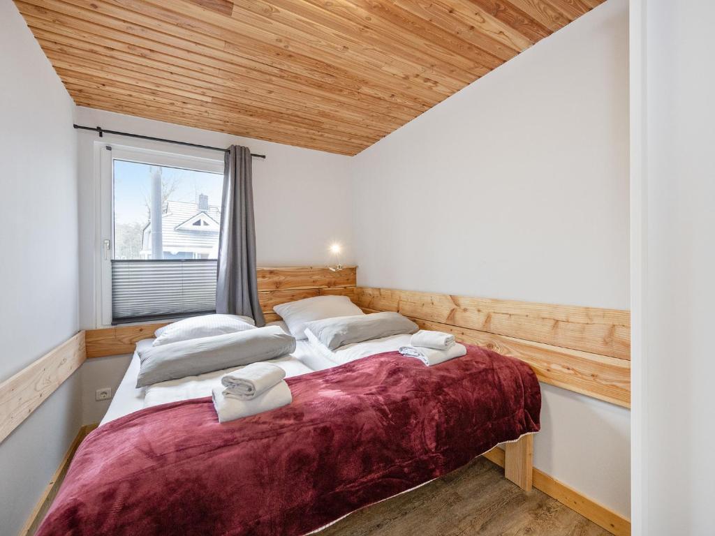 Postel nebo postele na pokoji v ubytování Dünenblick 3