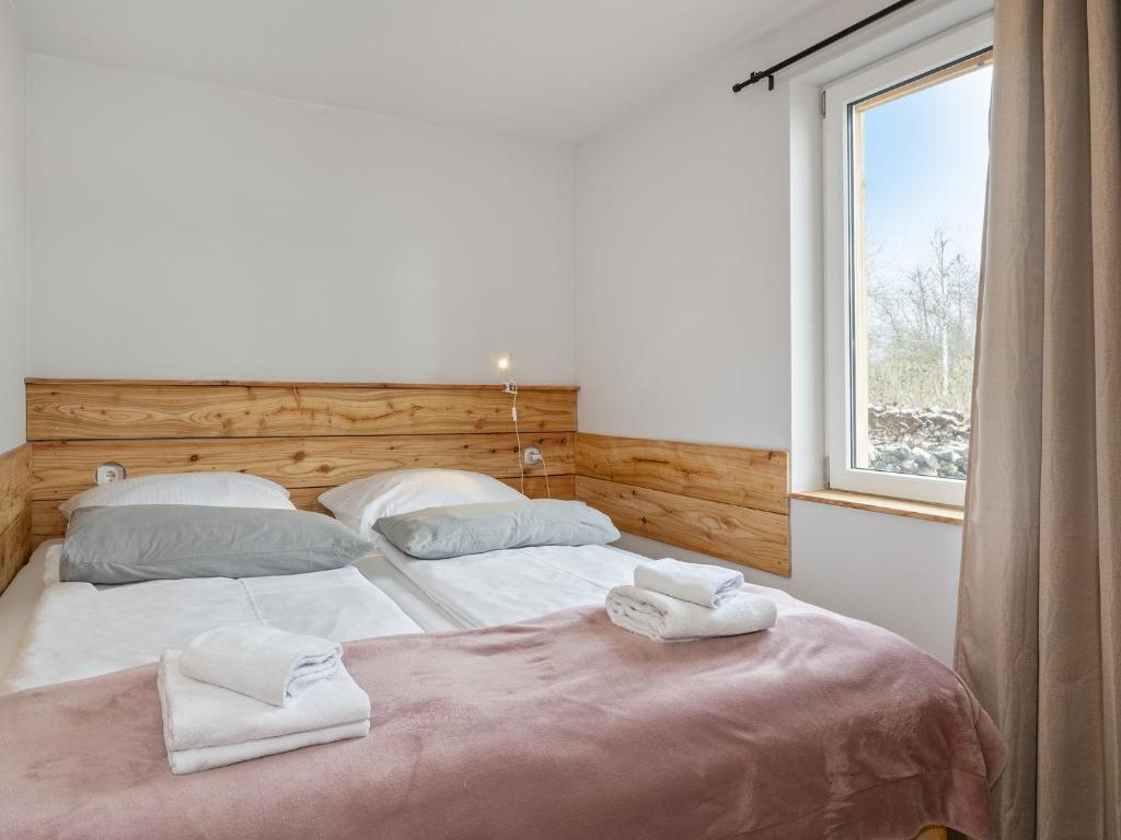 Postel nebo postele na pokoji v ubytování Dünenblick 3
