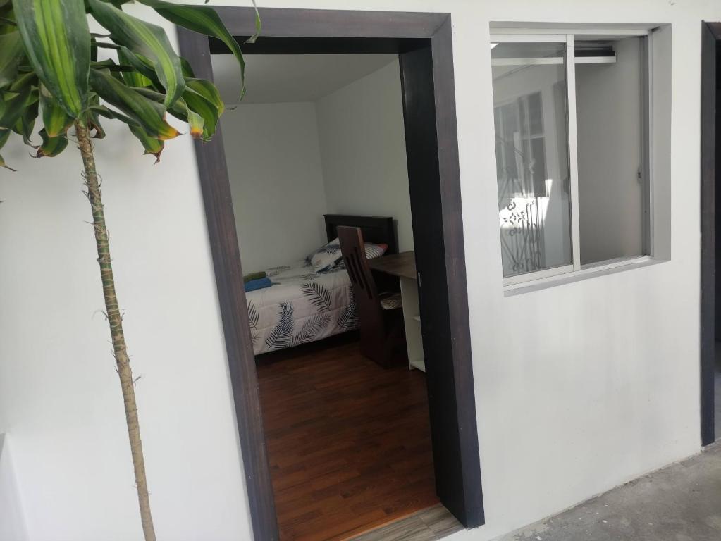 Postel nebo postele na pokoji v ubytování Zidko Guest House