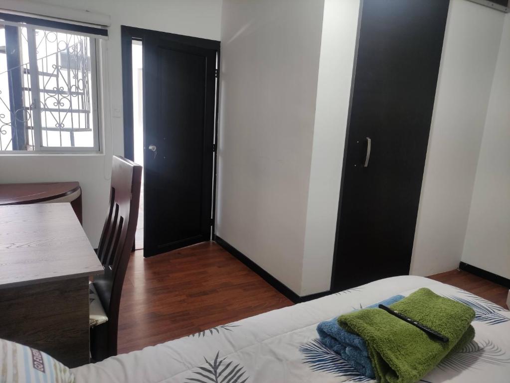 Postel nebo postele na pokoji v ubytování Zidko Guest House