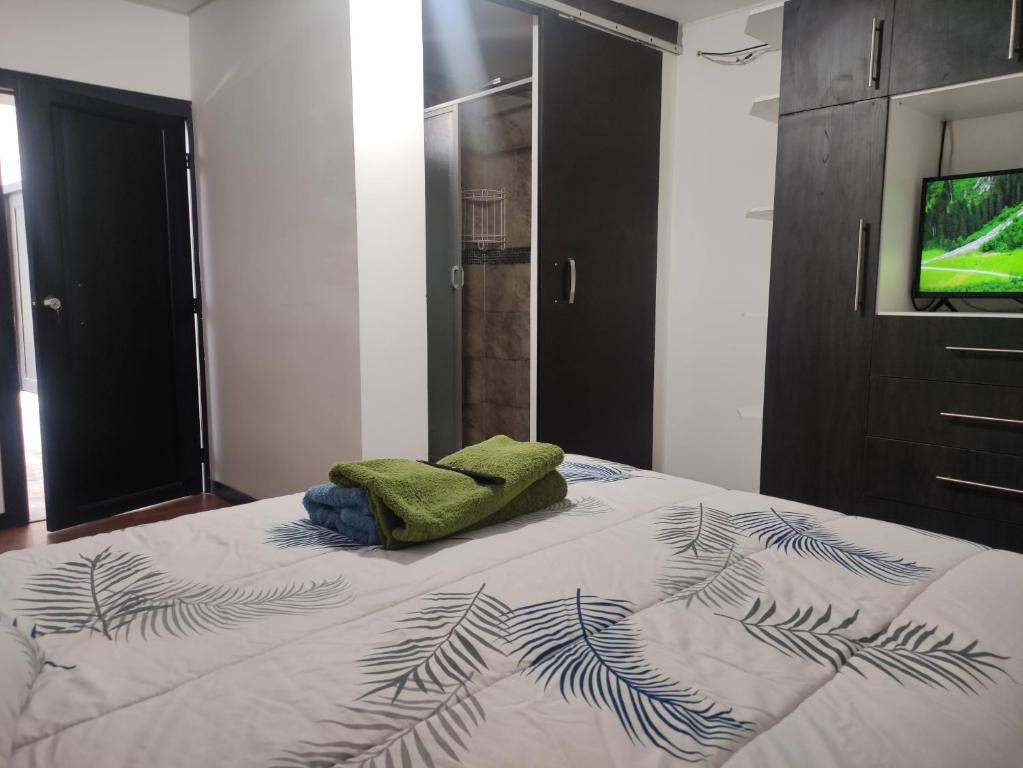 Postel nebo postele na pokoji v ubytování Zidko Guest House
