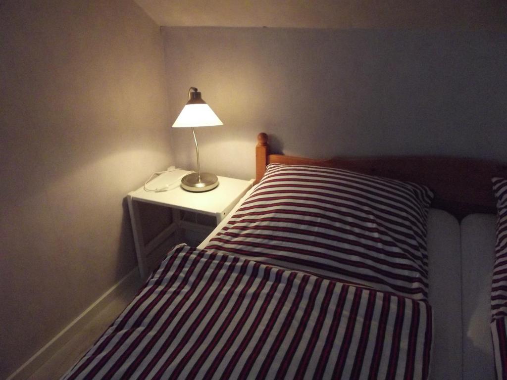Postel nebo postele na pokoji v ubytování "Ferienhaus Vadersdorf" Wohnung 1