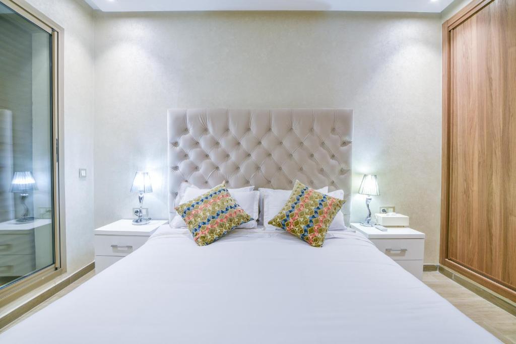 Postel nebo postele na pokoji v ubytování Appartement Belle Vue Agadir