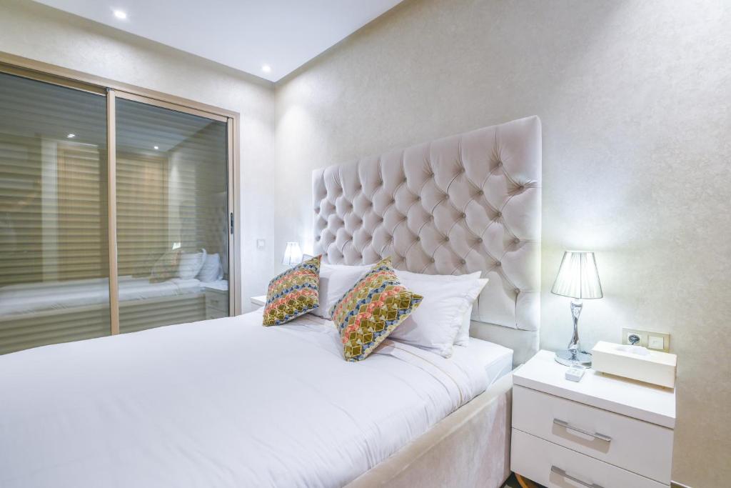 Postel nebo postele na pokoji v ubytování Appartement Belle Vue Agadir
