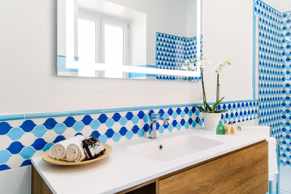 Koupelna v ubytování Sirenuse Home & Suites