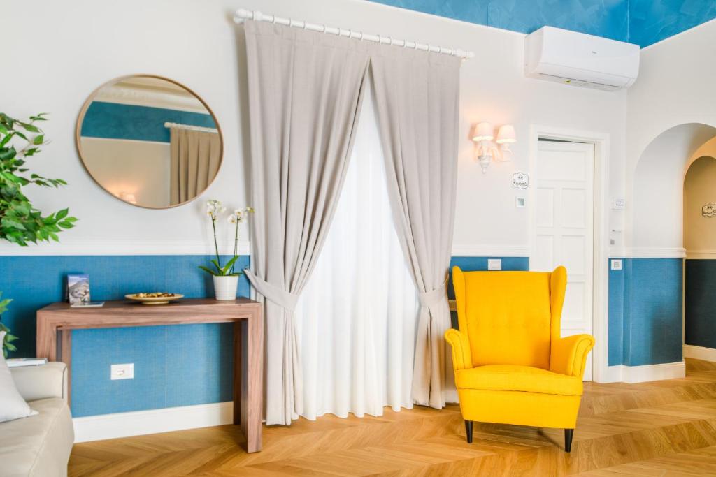 Posezení v ubytování Sirenuse Home & Suites