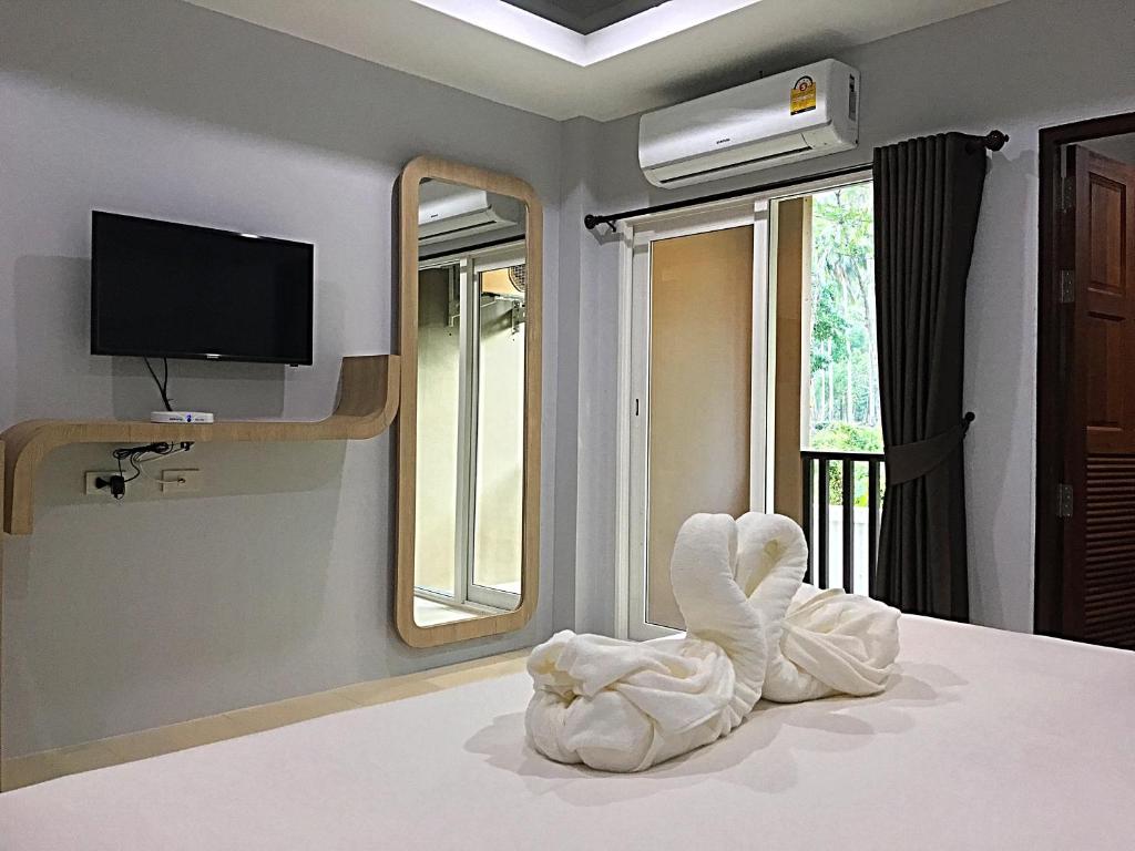 Кровать или кровати в номере Tonsai Bay Resort
