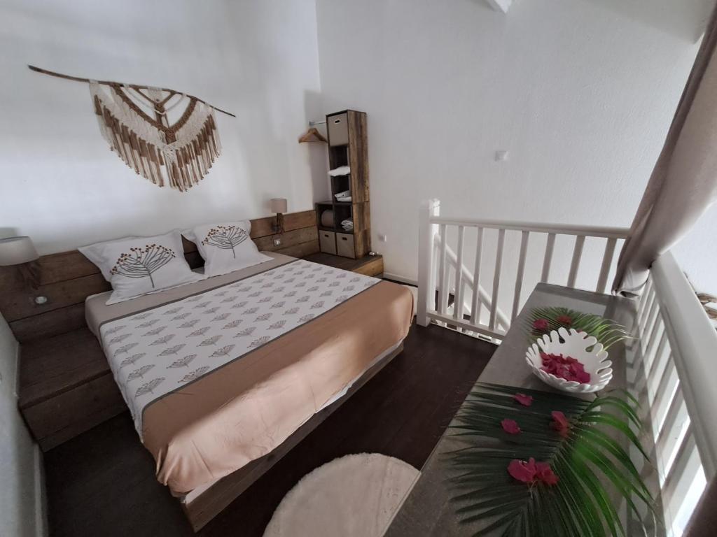 En eller flere senge i et værelse på Duplex entre mer et golf