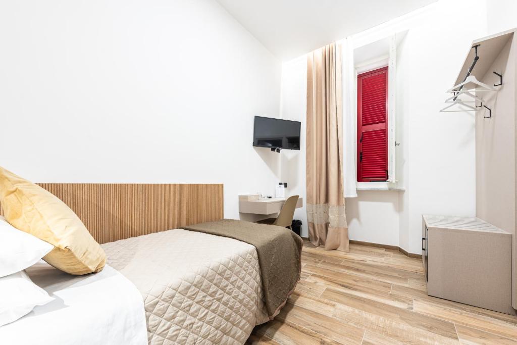 Postel nebo postele na pokoji v ubytování CHD Rooms