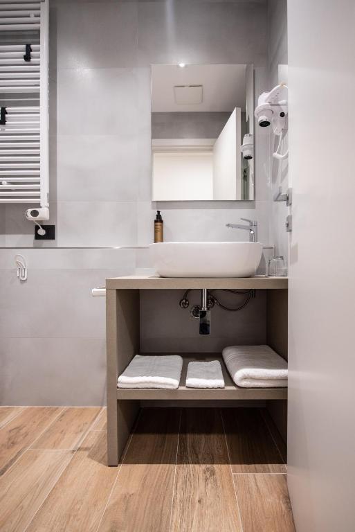 Koupelna v ubytování CHD Rooms