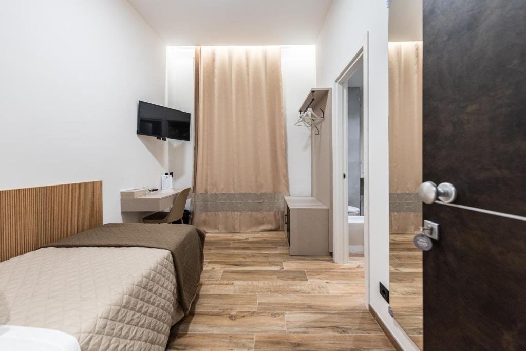 TV a/nebo společenská místnost v ubytování CHD Rooms