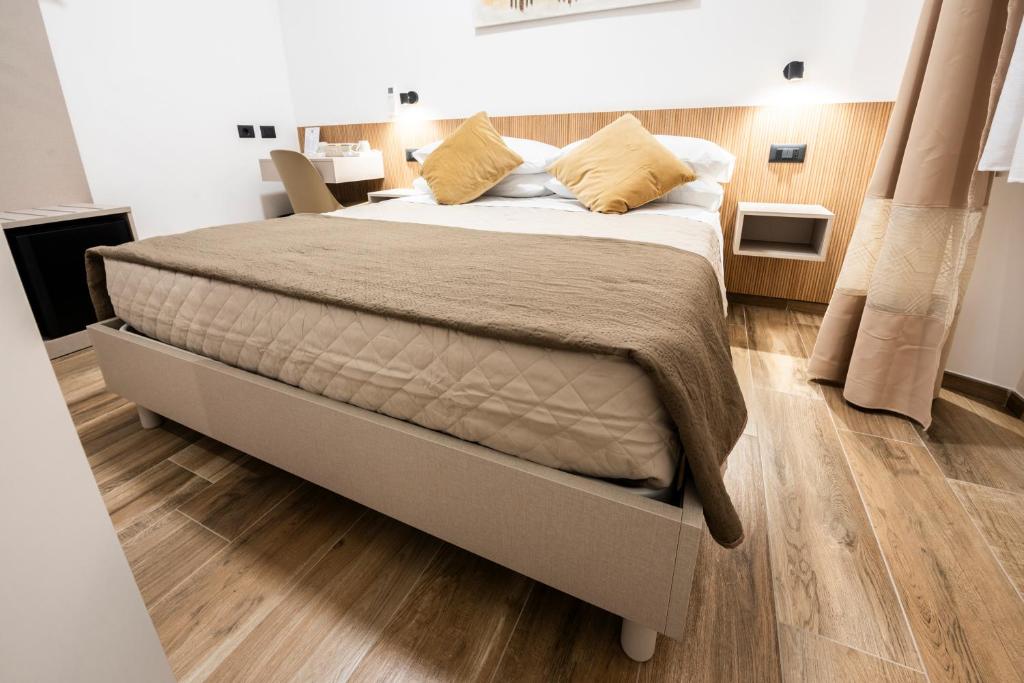 Postel nebo postele na pokoji v ubytování CHD Rooms
