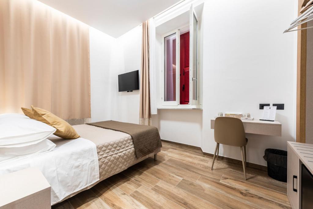 Postel nebo postele na pokoji v ubytování CHD Rooms