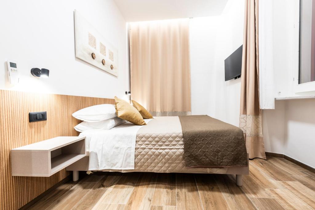 Postel nebo postele na pokoji v ubytování CHD Rooms