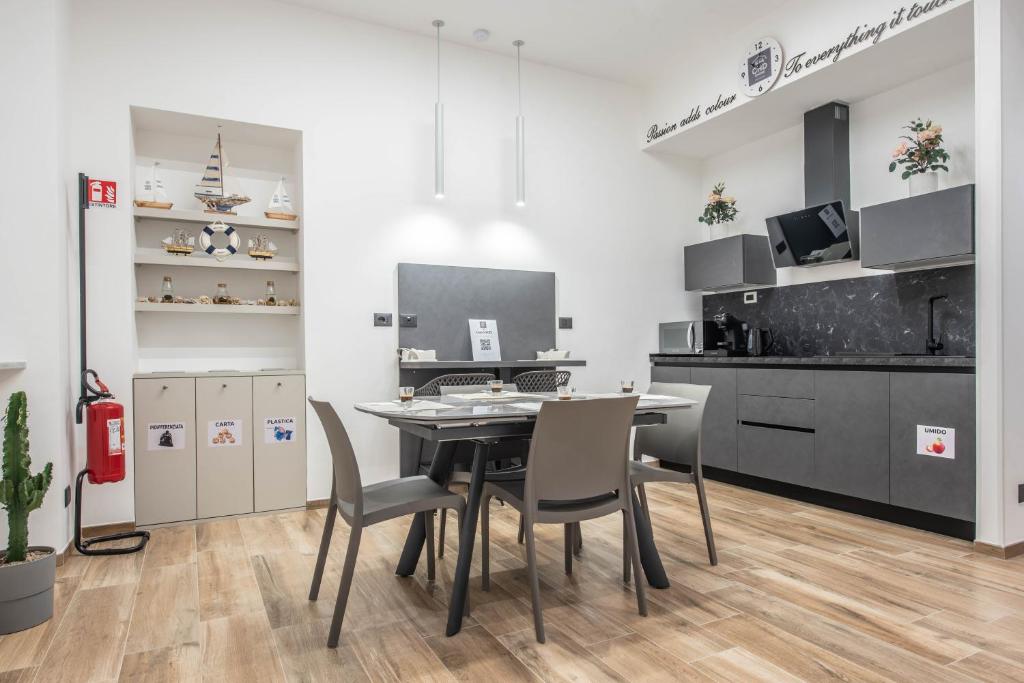 Kuchyň nebo kuchyňský kout v ubytování CHD Rooms
