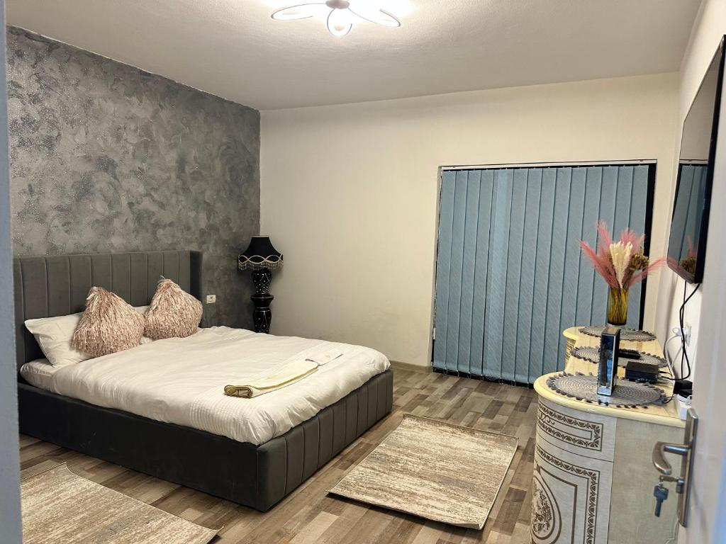 Postel nebo postele na pokoji v ubytování Mario apartament