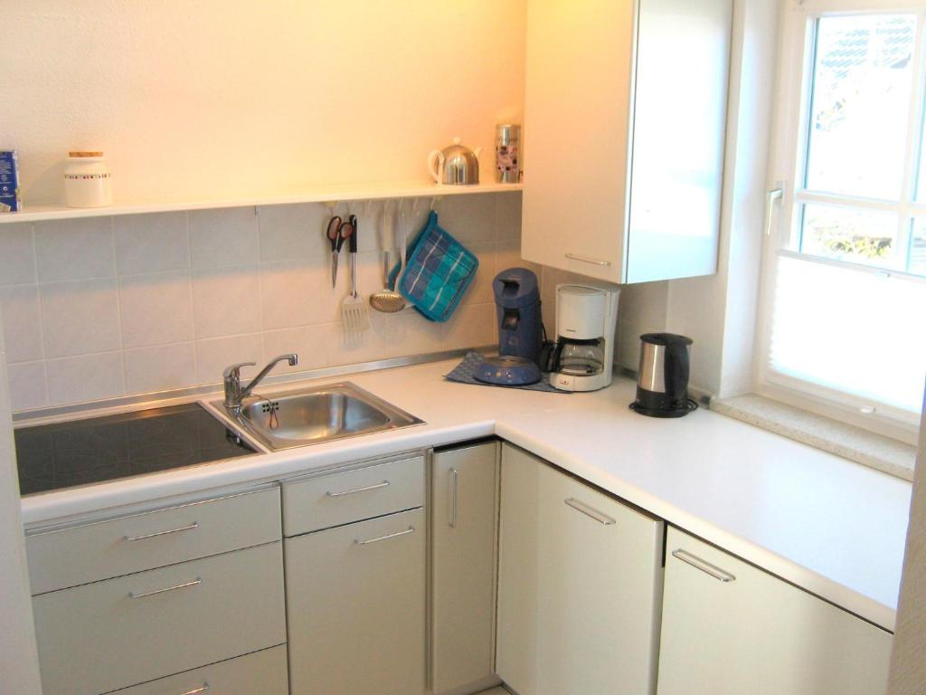 Kuchyň nebo kuchyňský kout v ubytování Hamburger Str 8 I - Wohnung "Bentje"