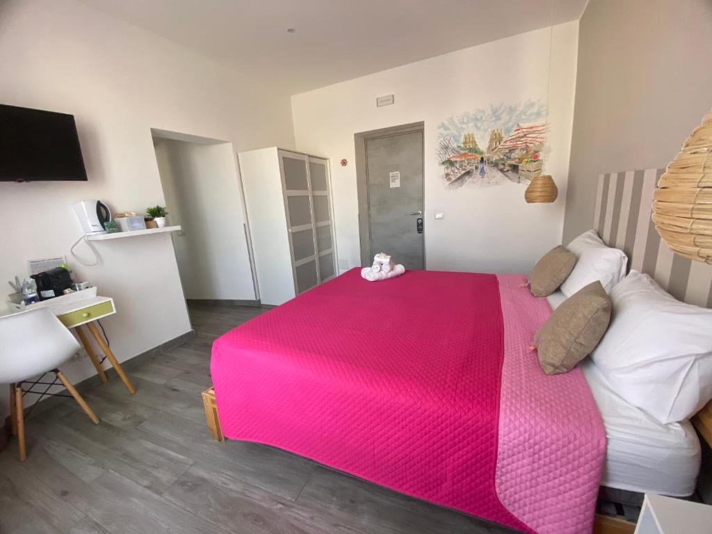 Postel nebo postele na pokoji v ubytování La Piccola Formica Charme Rooms