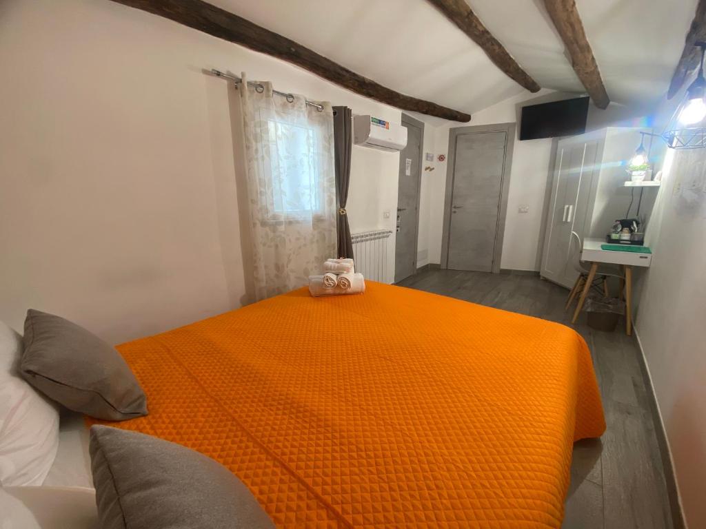 Postel nebo postele na pokoji v ubytování La Piccola Formica Charme Rooms