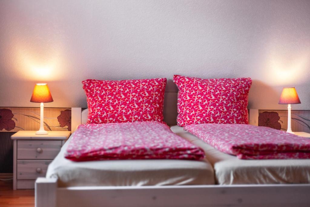 Postel nebo postele na pokoji v ubytování Haus Max
