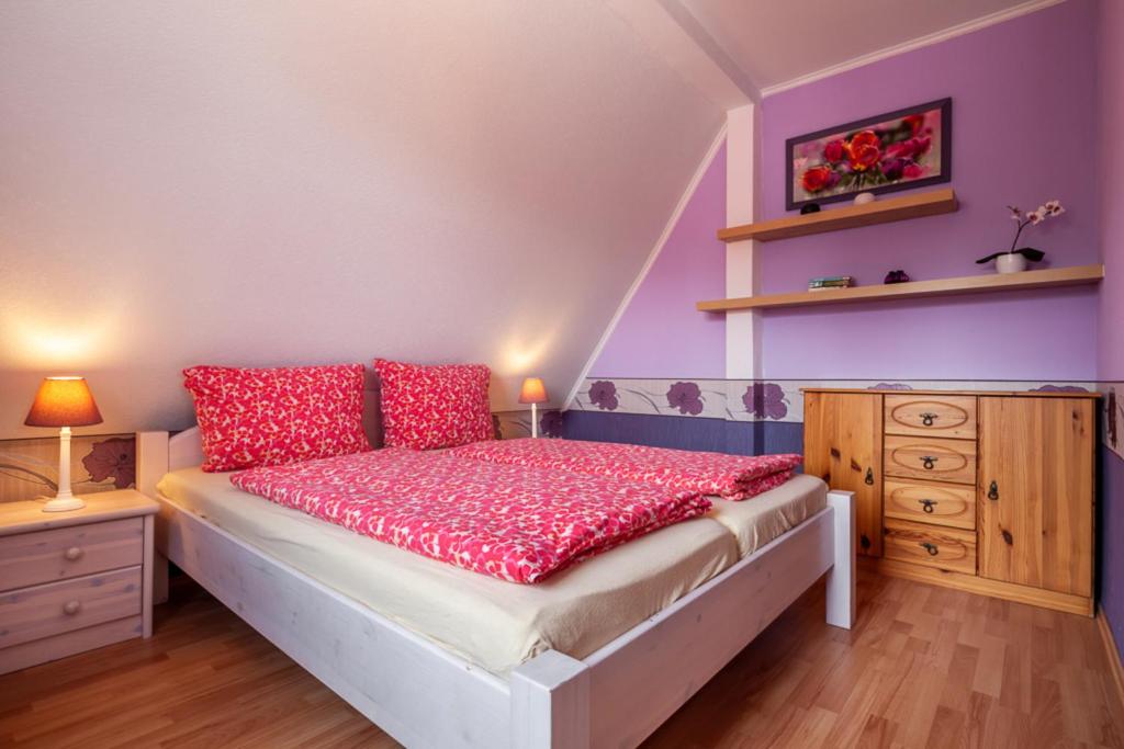 Postel nebo postele na pokoji v ubytování Haus Max