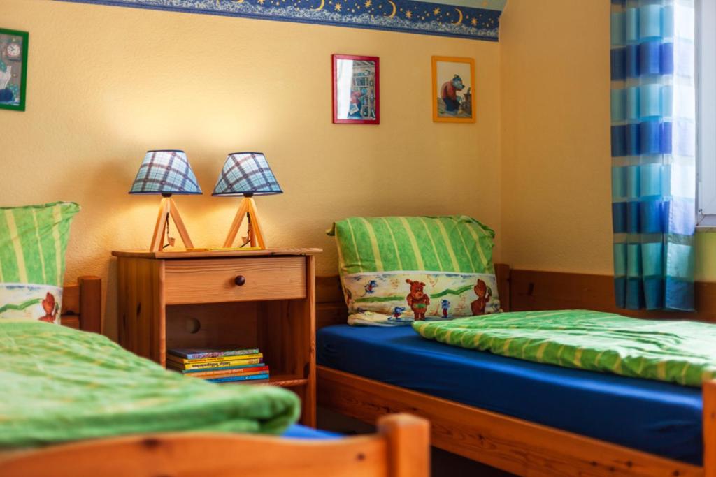 Postel nebo postele na pokoji v ubytování Haus Max