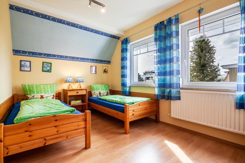 Postel nebo postele na pokoji v ubytování Haus Max