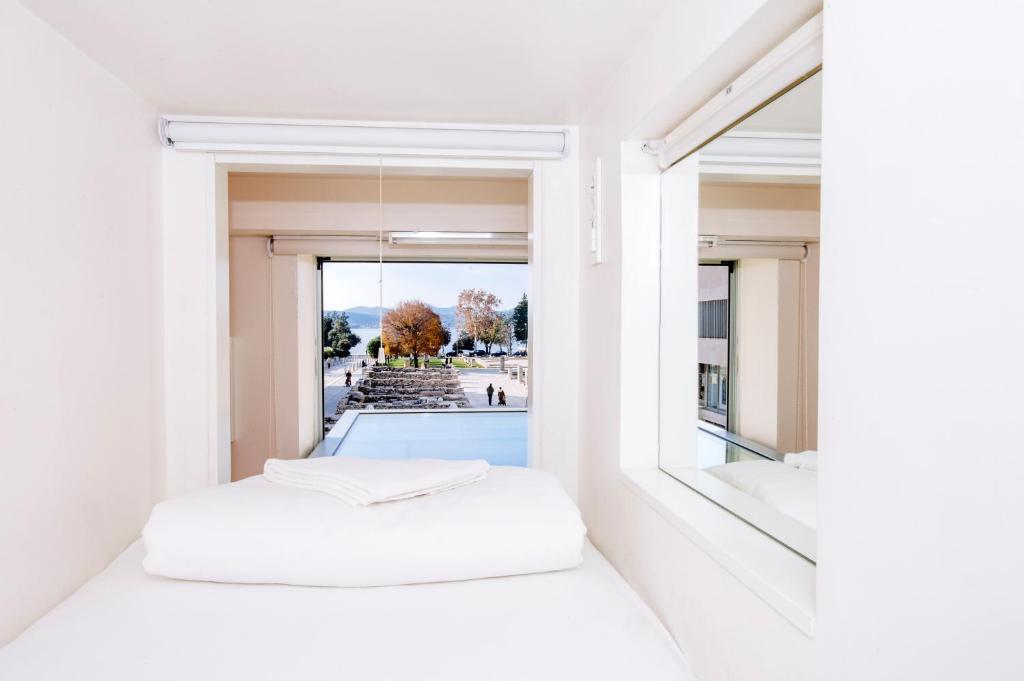Postel nebo postele na pokoji v ubytování Boutique Hostel Forum