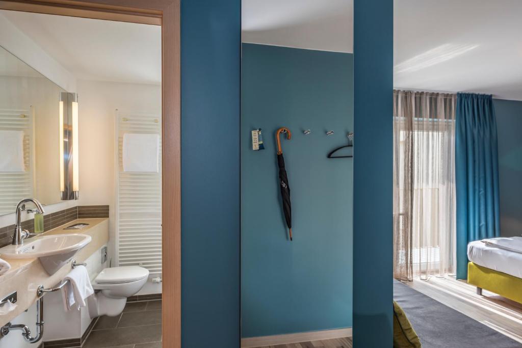 Koupelna v ubytování Bavaria Boutique Hotel
