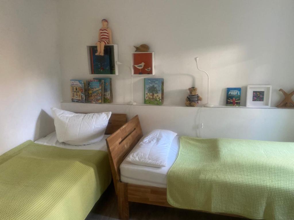 Postel nebo postele na pokoji v ubytování Hamburger Str 8 J - Wohnung "Fiete"