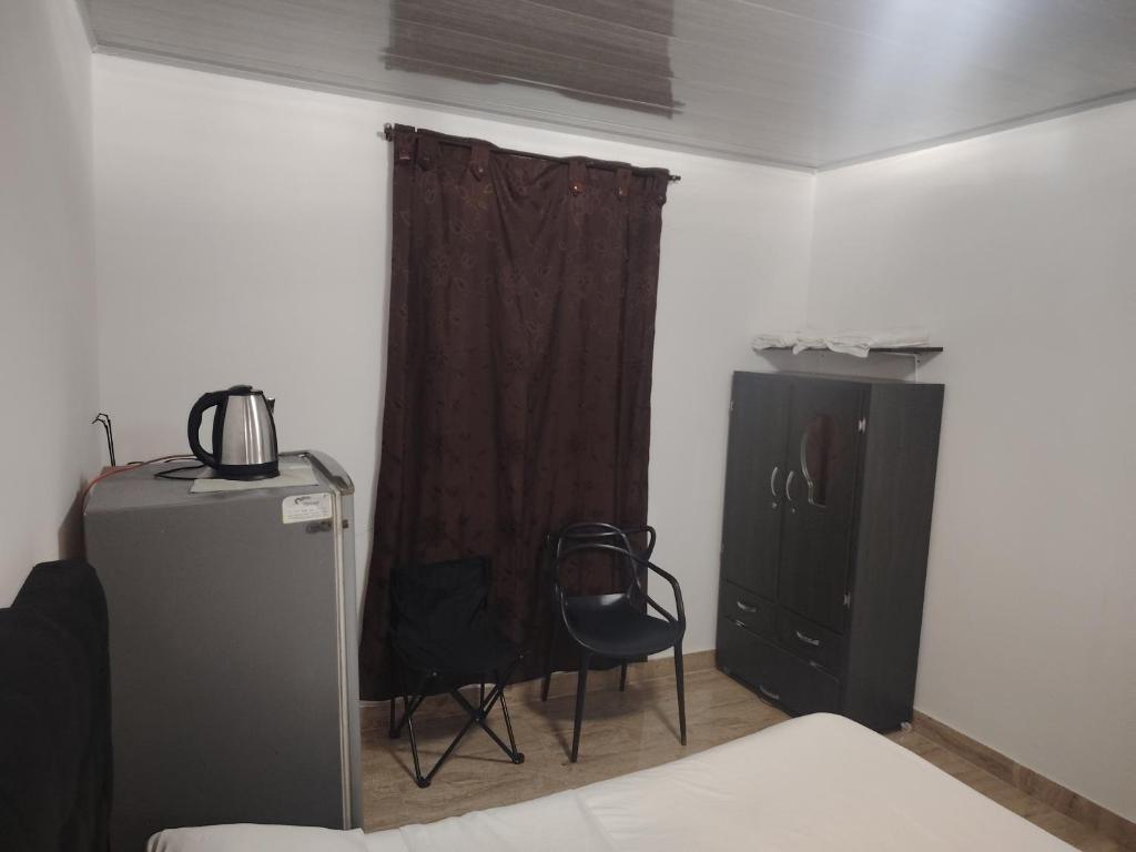 Kuchyň nebo kuchyňský kout v ubytování Hotel Palmari