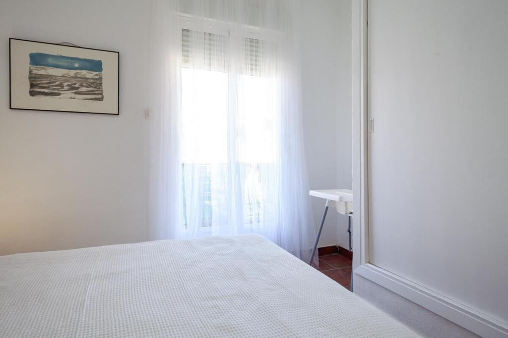 A bed or beds in a room at SWEET HOME LOS BELONES
