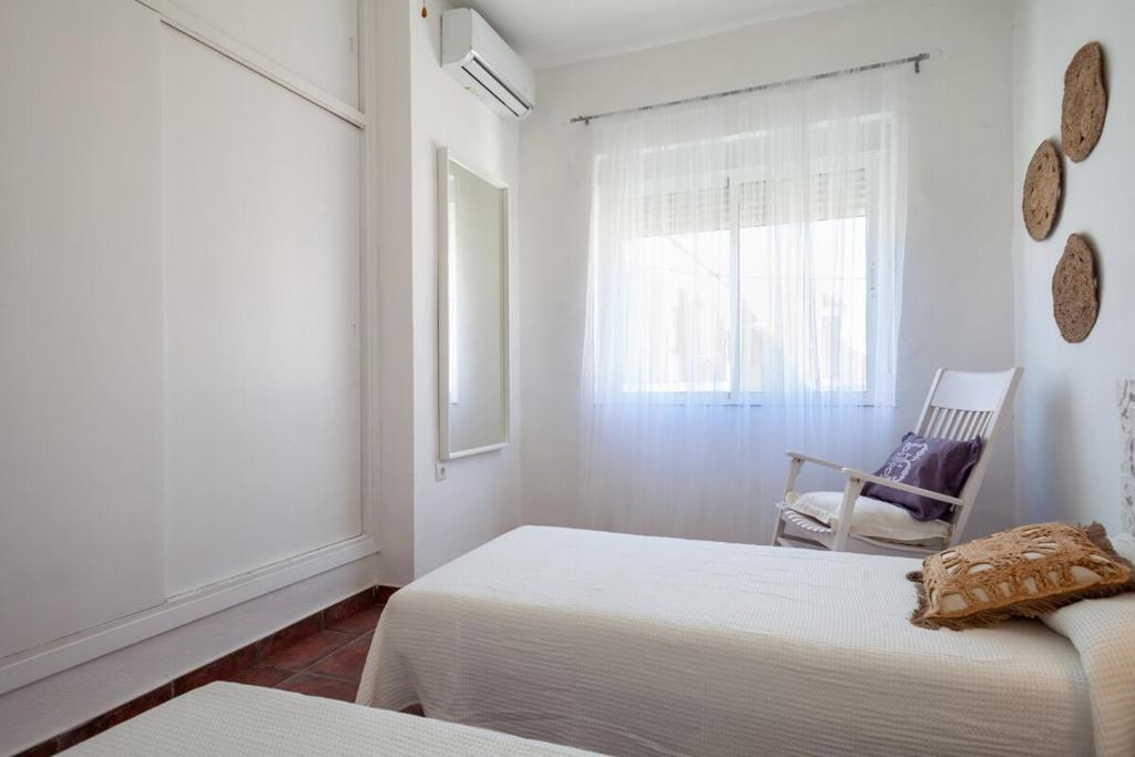 A bed or beds in a room at SWEET HOME LOS BELONES