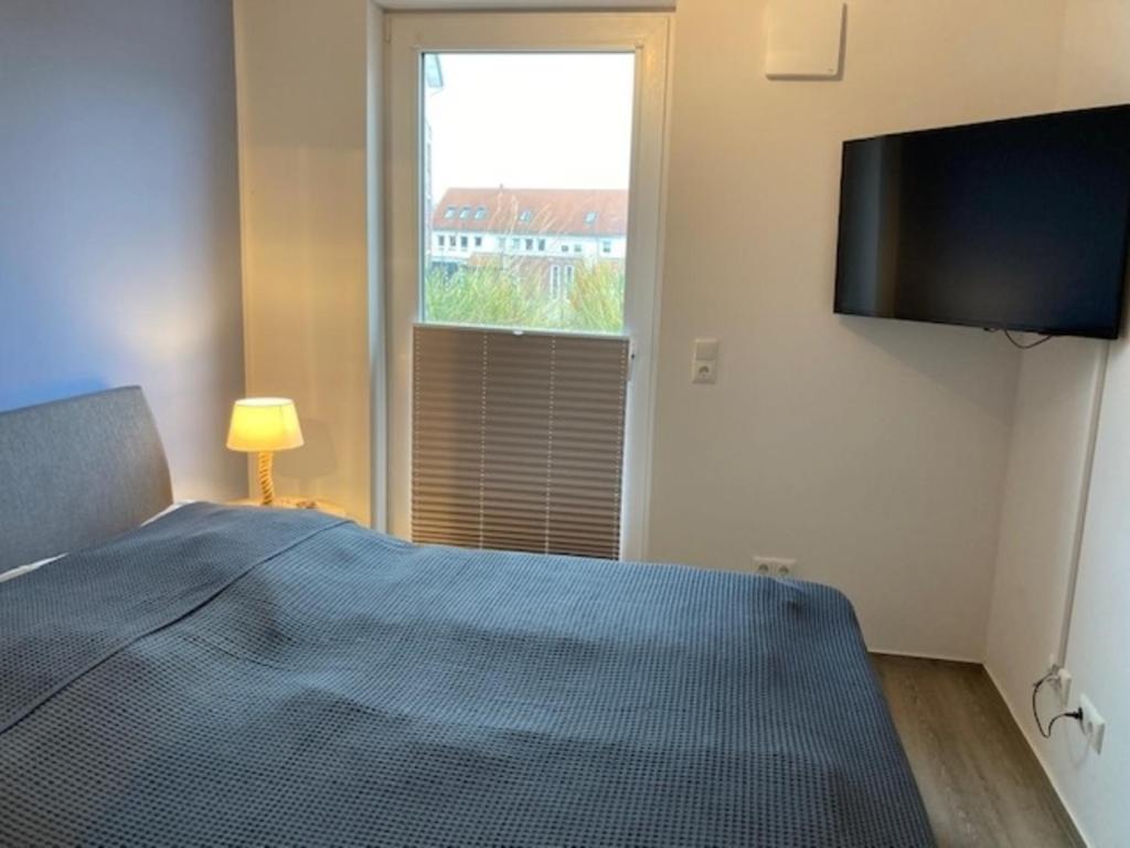 Postel nebo postele na pokoji v ubytování Kabine 04