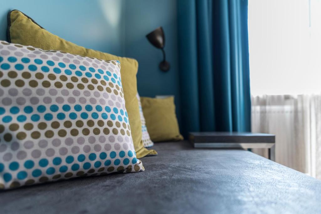 Postel nebo postele na pokoji v ubytování Bavaria Boutique Hotel