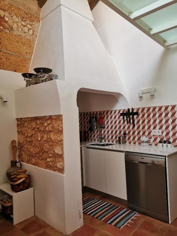 Kuchyň nebo kuchyňský kout v ubytování BeGuest Casas de Taipa